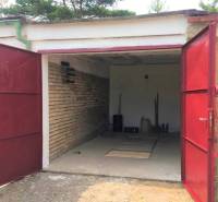 An open garage on Michalovská Street in the Západ district of Košice.