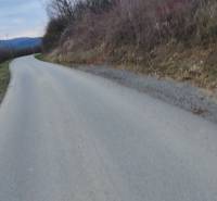 Road to Recreational Lands in Holčíkovce, Eva Street, surrounded by nature and hills.