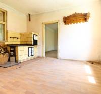 An old wood stove in the interior of a family house.