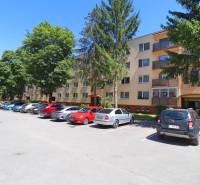 Apartment building on Hliny Street in Považská Bystrica with parking and greenery.