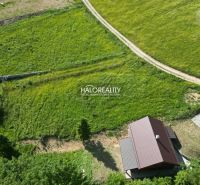 Aerial view of Recreational plots in Vyšné Ružbachy with green meadows and a house.