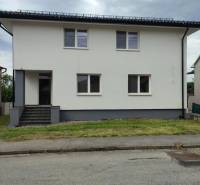 A family house on Nezabudova Street in Sabinov with a white facade and a gray roof.