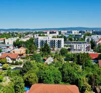 View of greenery and buildings in Bratislava - Podunajské Biskupice, Geologická Street.