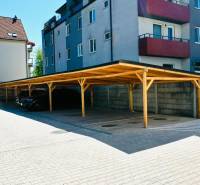 Covered parking lot near the apartment building on Geologická Street in Bratislava - Podunajské Biskupice.