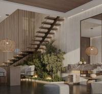 Interior of a family house with a staircase, dining table, and designer lights.