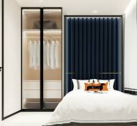 Stylish bedroom with a spacious wardrobe and bed in a 3-room apartment.