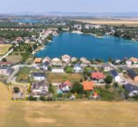 Aerial view of the cottage area near the water body in Dunajská Lužná, Land - housing.