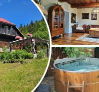 A family house in Donovaly with a rustic interior, an outdoor sauna, and a spacious garden.