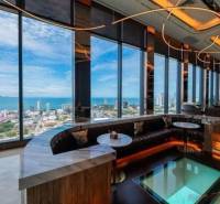 Interior with glass views of the panorama and sea within the construction of apartments.