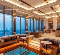 Luxury interior of apartment development with panoramic city views.
