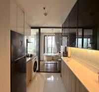 Kitchen in a 3-room apartment with a view of the dining area.