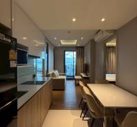 Kitchen and dining room in a 3-room apartment with a view from the balcony.