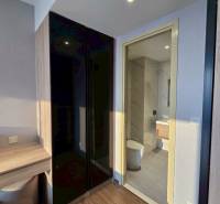 Compact interior of a 3-room apartment with a bathroom and a built-in wardrobe.