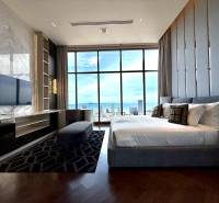 Luxury bedroom in a 4-room apartment with a stunning view of Pattaya.