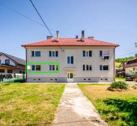Two-story building with a garden in Púchov, offering a 2-bedroom apartment.