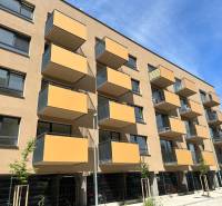 Apartment building with balconies on Sadova Street in Senica, near the garages.