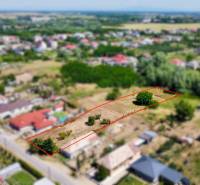 Building plot on Mlynská Street in Biel. Surrounding development, nature.