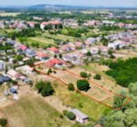 Exterior photograph from Biel on Mlynská Street: Plots - housing, rural environment, area.