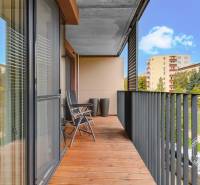 A balcony in a 2-room apartment with a view of Seberíniho Street in Ružinov, Bratislava.