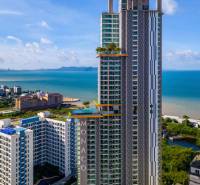 Apartment construction in Pattaya, high-rise buildings with sea views.