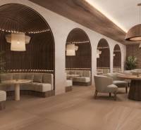 Interior of a family house with elegant armchairs, wooden tables, and interesting lighting.