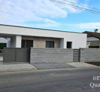 A family house in the village of Tureň with modern architecture and a stone facade.