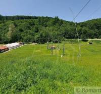 Green hills, forests, and a ski lift in the outdoor area near Stará Myjava.