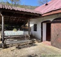 A rustic cottage with stone stairs and a shelter is among the unique properties.