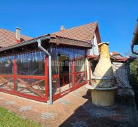 Terrace of a family house in Malá Lehota with a grill and paved surroundings.