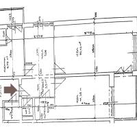 Floor plan of a 2-room apartment with a kitchen, a room, and an entrance area.