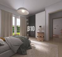 Children's room with a bed, decorations, and access to the garden in a family house.