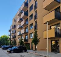 Apartment building on Sadova Street in Senica with parking and balconies for 2-room apartments.