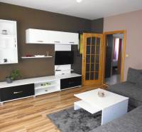 Living room with a TV, sofa, and furniture in a 3-room apartment.