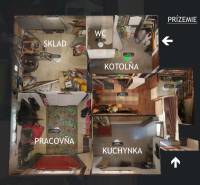 Floor plan with rooms: storage, office, toilet, boiler room, and kitchenette in a family house.