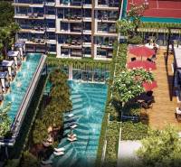 The construction of apartments in Pattaya includes a pool, terraces, and greenery for residents.