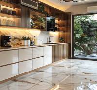 A kitchen in an apartment under construction with a marble floor and a view of the garden.