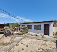 Family house on Riadok Street in Malacky with a yard and garden, next to a well.