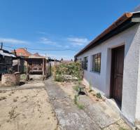 A family house on Riadok Street in Malacky with an older garden and yard.