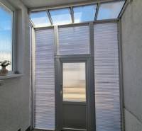 Entrance area with glass doors in a family house.