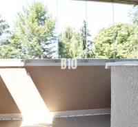 Glazed balcony with a view of greenery in a 3-room apartment in Bytča.