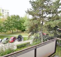 View from a 2-room apartment on Smolnícka Street in Bratislava-Ružinov. Parking and greenery.