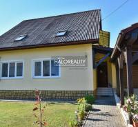 Yellow family house in Župkov with a terrace and garden, parking space.