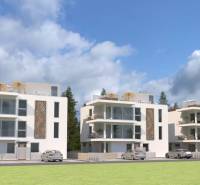 Apartment buildings with modern architecture and balconies, suitable for a 2-room apartment.