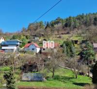 Houses on a slope with a forest on the outskirts of Považská Bystrica.