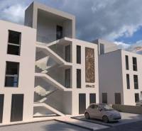 A modern building with parking and palm trees in the city of Vir, including a 2-room apartment.