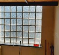 Glass wall with shelf, an element of the Housing Construction project.