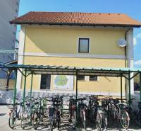 Bicycles parked in the shelter in front of commercial premises in St. Andrä am Zicksee.