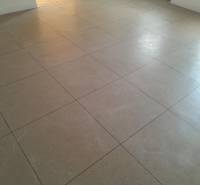 Commercial spaces with light tile flooring for a clean and airy design.