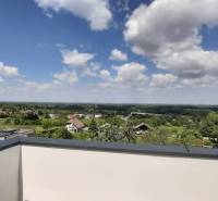 The view from the villa in Hainburg an der Donau over the vast landscape and sky.