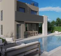 Villa in Poreč with a pool, garden, and seating area on the terrace.